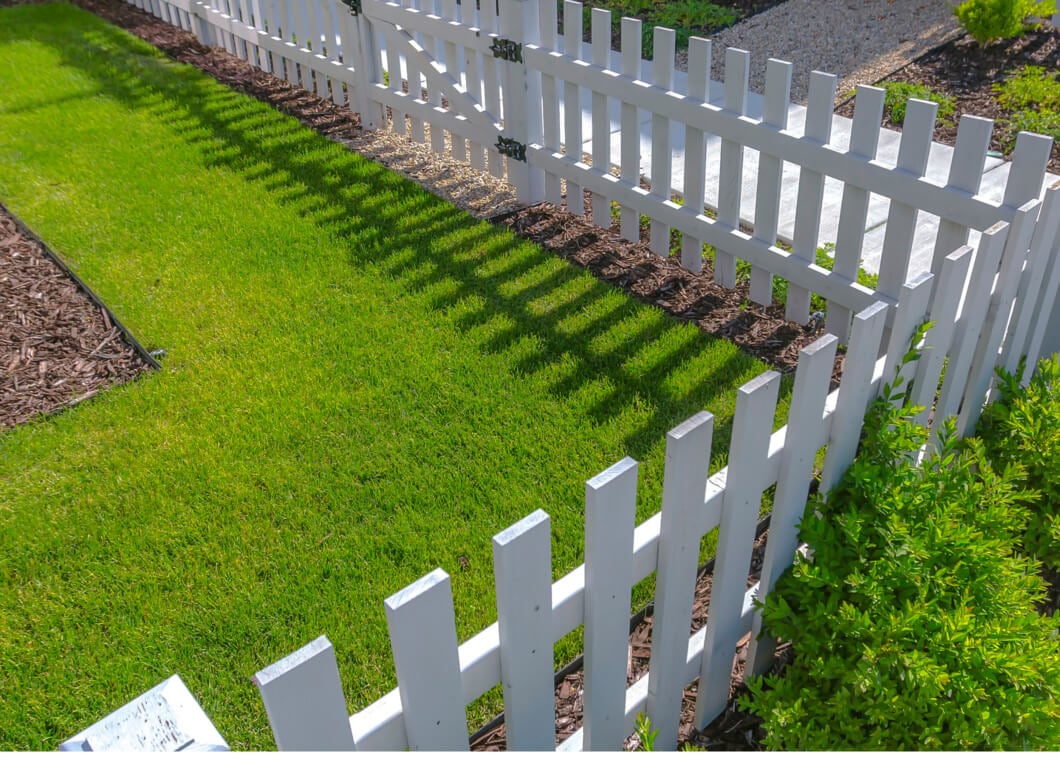 Garden fence with lawn