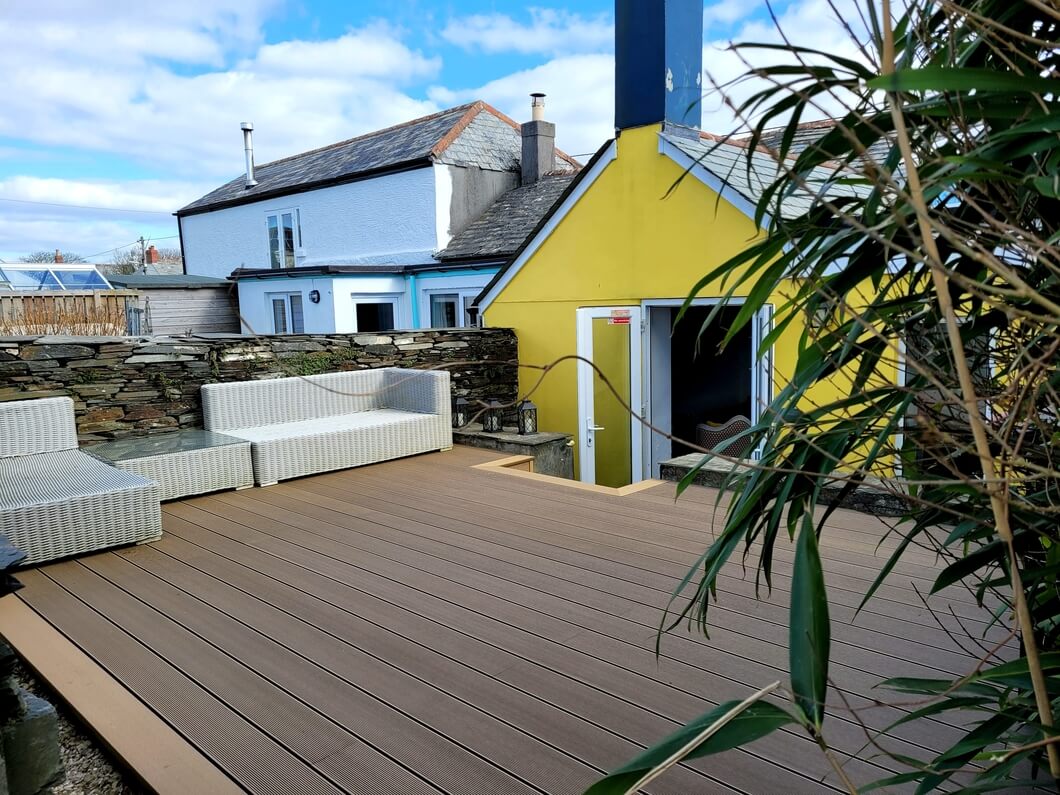 Yellow building with teak deck