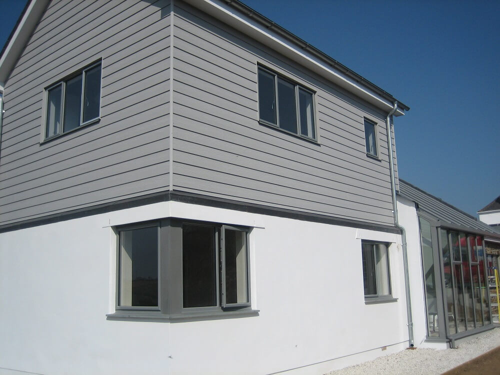 House using stone grey composite cladding