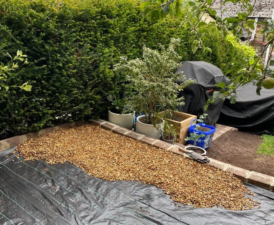 Weed Mat installation with chippings