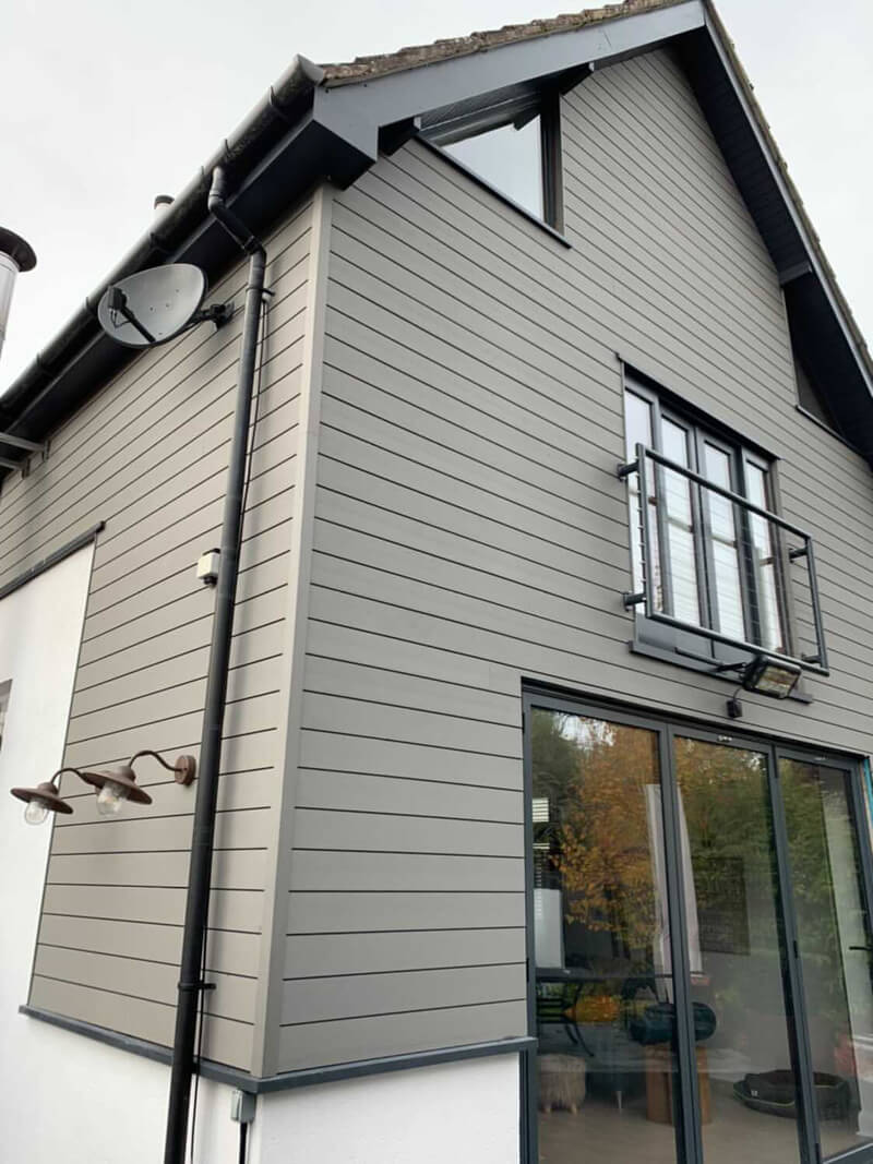 House clad in Cladco Composite Stone Grey Wall Cladding Boards