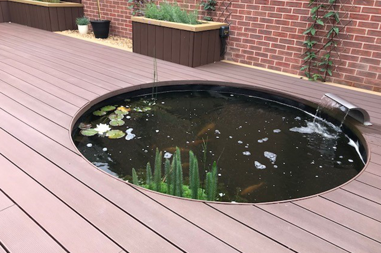 Cladco Composite Decking Boards in Coffee with Teak Edging Trim