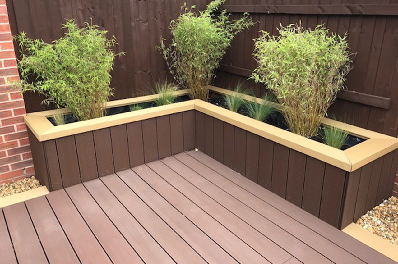 Cladco Composite Decking Boards in Coffee with Teak Edging Trim