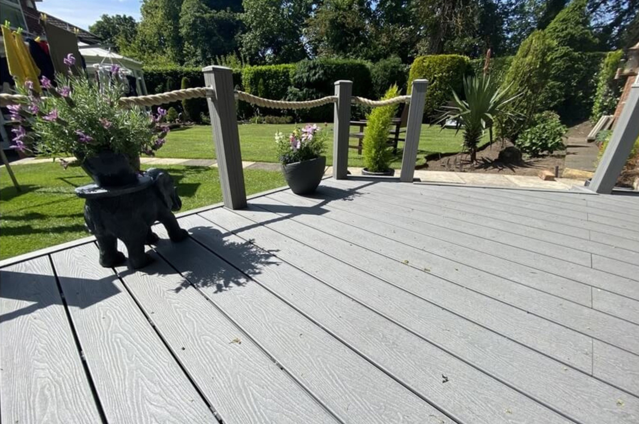 Composite Woodgrain Decking creates an attractive, low-maintenance, high-quality outdoor seating and eating area.