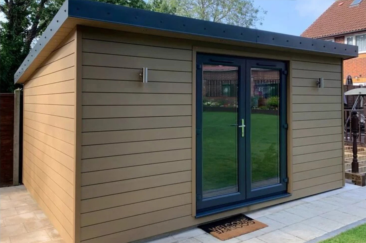Teak Composite Wall Cladding Boards form the exterior of this garden room