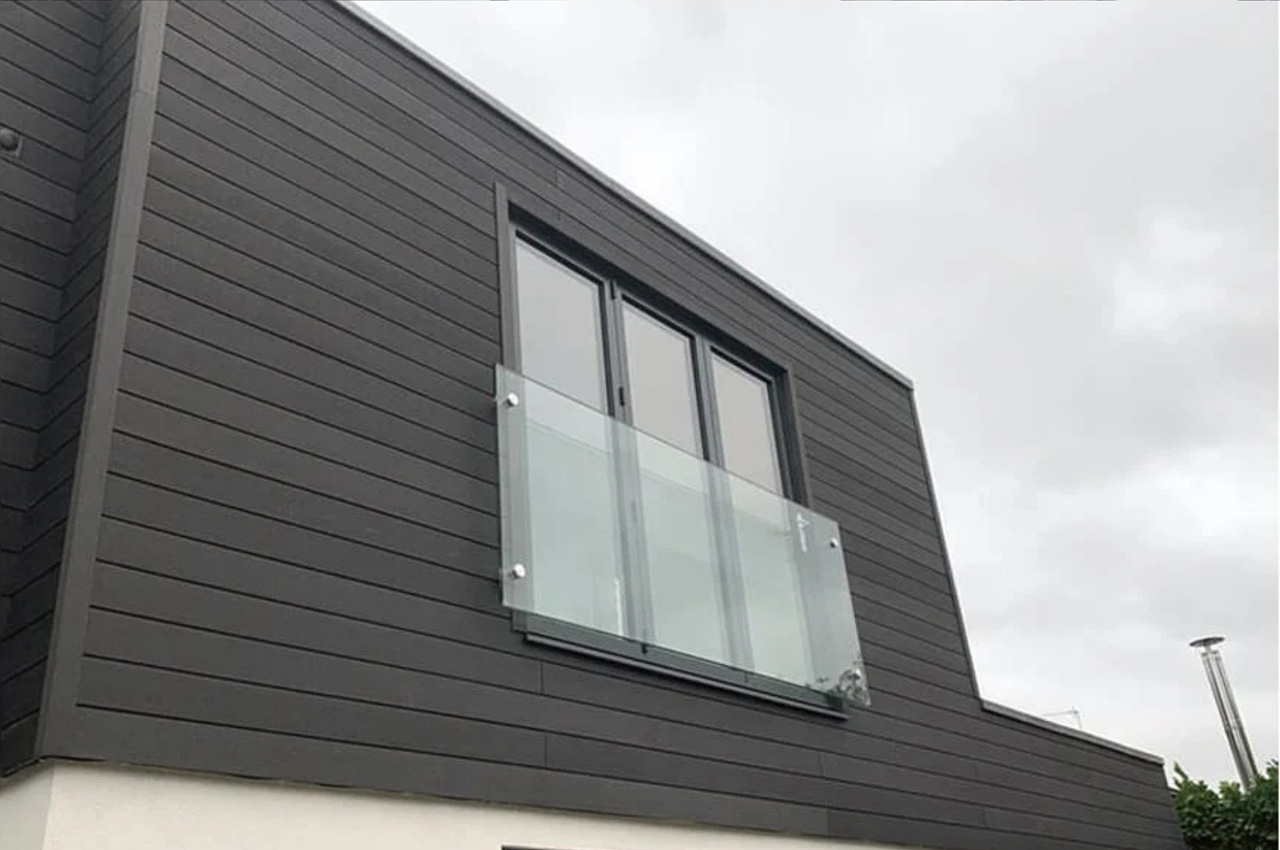 A large extension designed with Cladco Composite Wall Cladding Boards in Charcoal