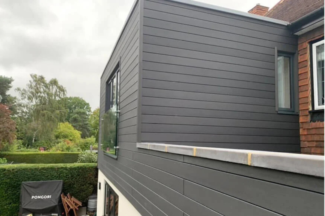 A large extension designed with Cladco Composite Wall Cladding Boards in Charcoal