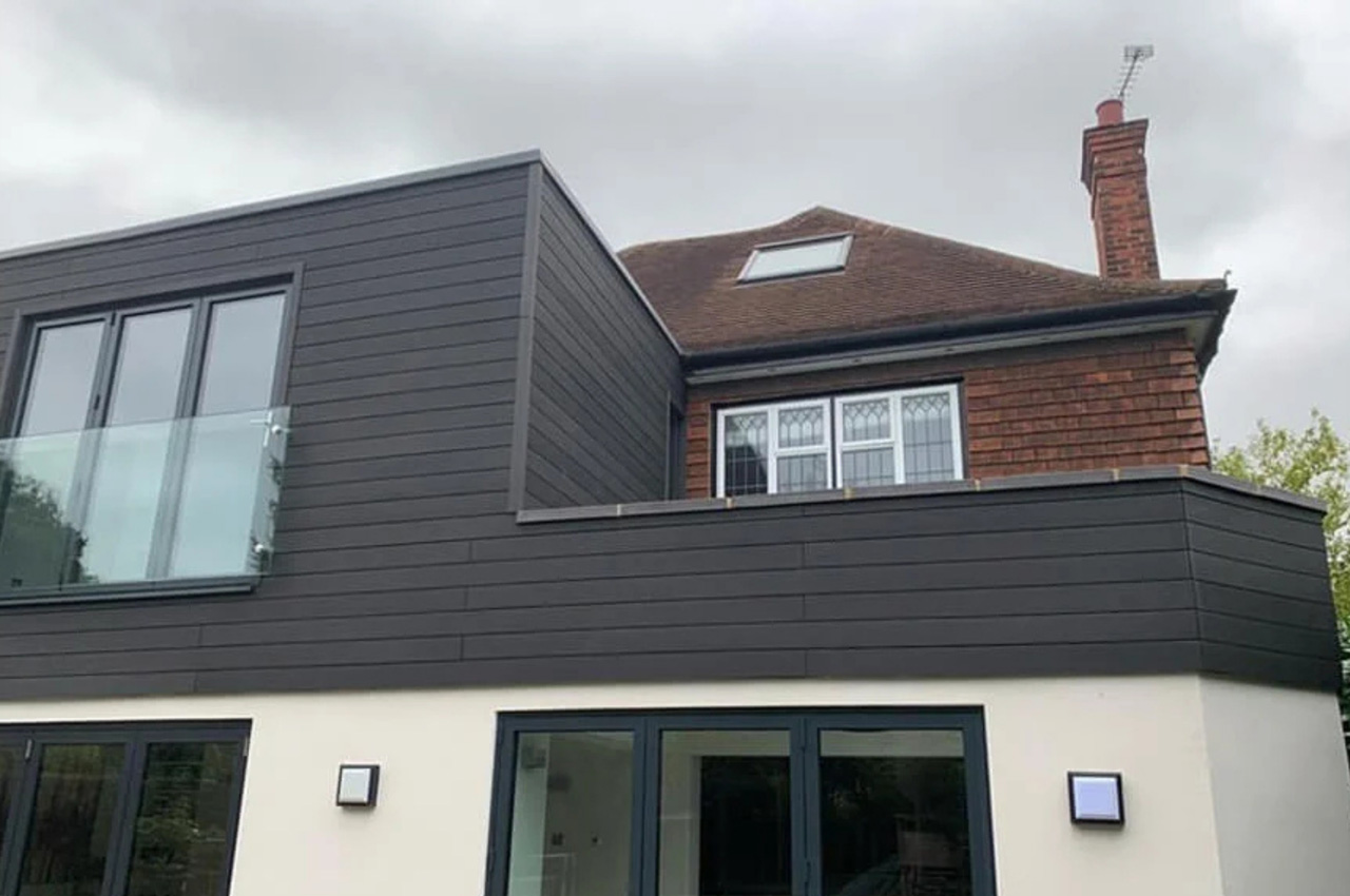 A large extension designed with Cladco Composite Wall Cladding Boards in Charcoal