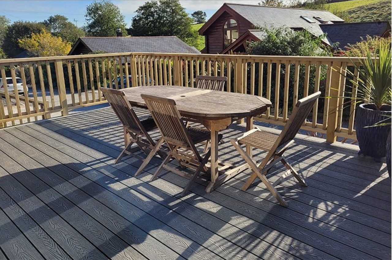 Stone Grey Woodgrain Composite Decking Boards installed by Gull Rock Co.