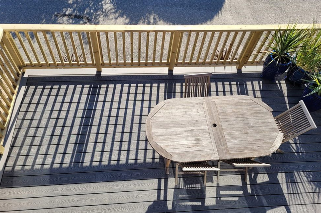 Stone Grey Woodgrain Composite Decking Boards installed by Gull Rock Co.