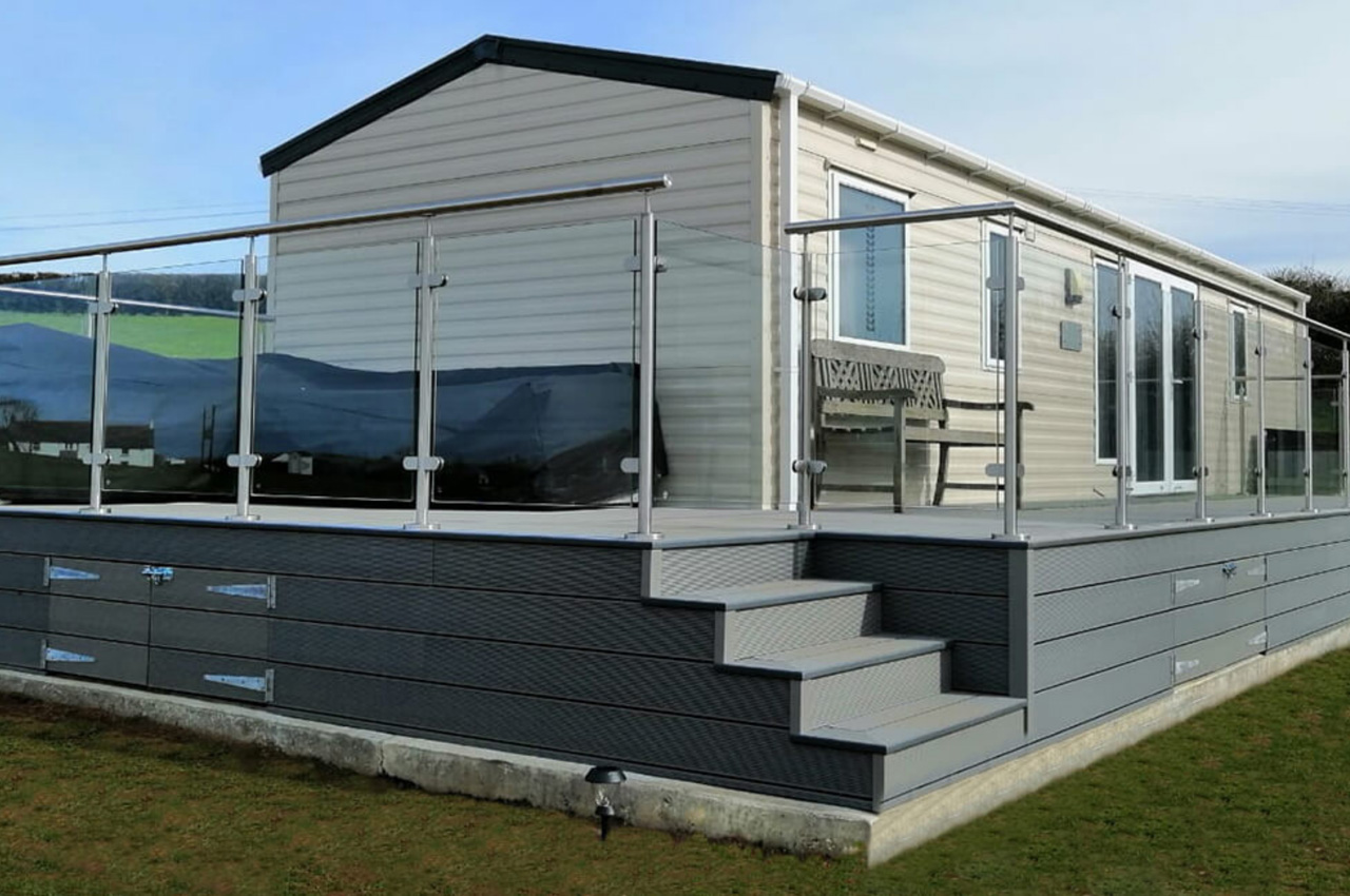 Cladco Composite Decking terrace area with stainless steel and glass balustrades.