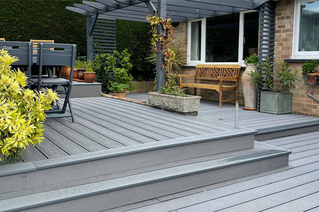 Garden Decking Space With Woodgrain Effect Composite Decking in Light Grey
