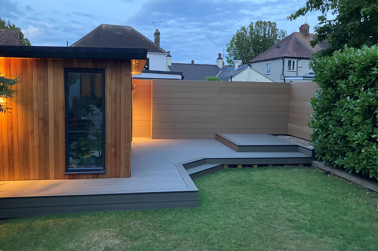 Combination of Composite Decking in Olive Green and Composite Fencing in Teak