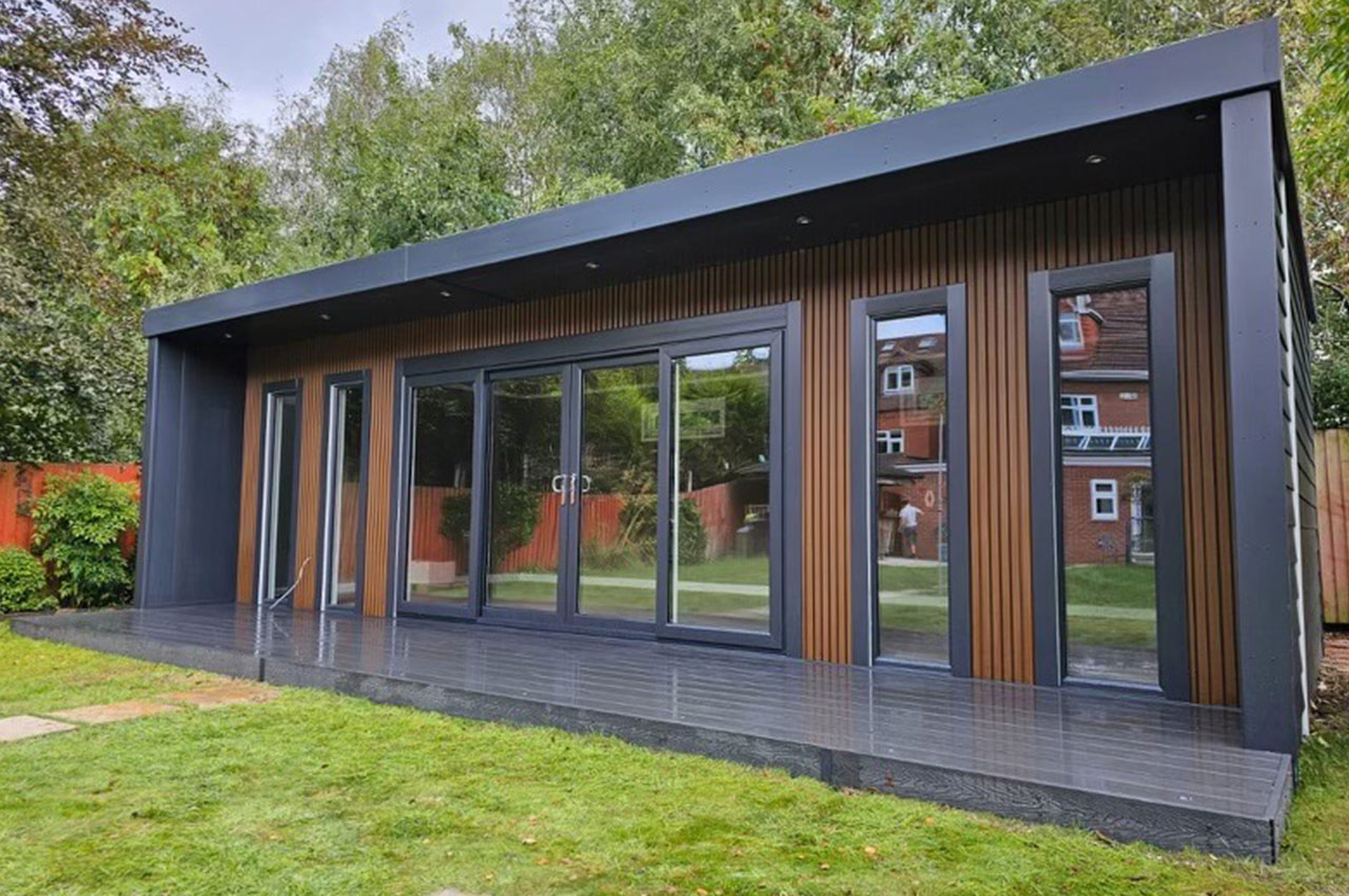  Modern summerhouse with Cladco Composite Slatted Cladding and Woodgrain Composite Decking.