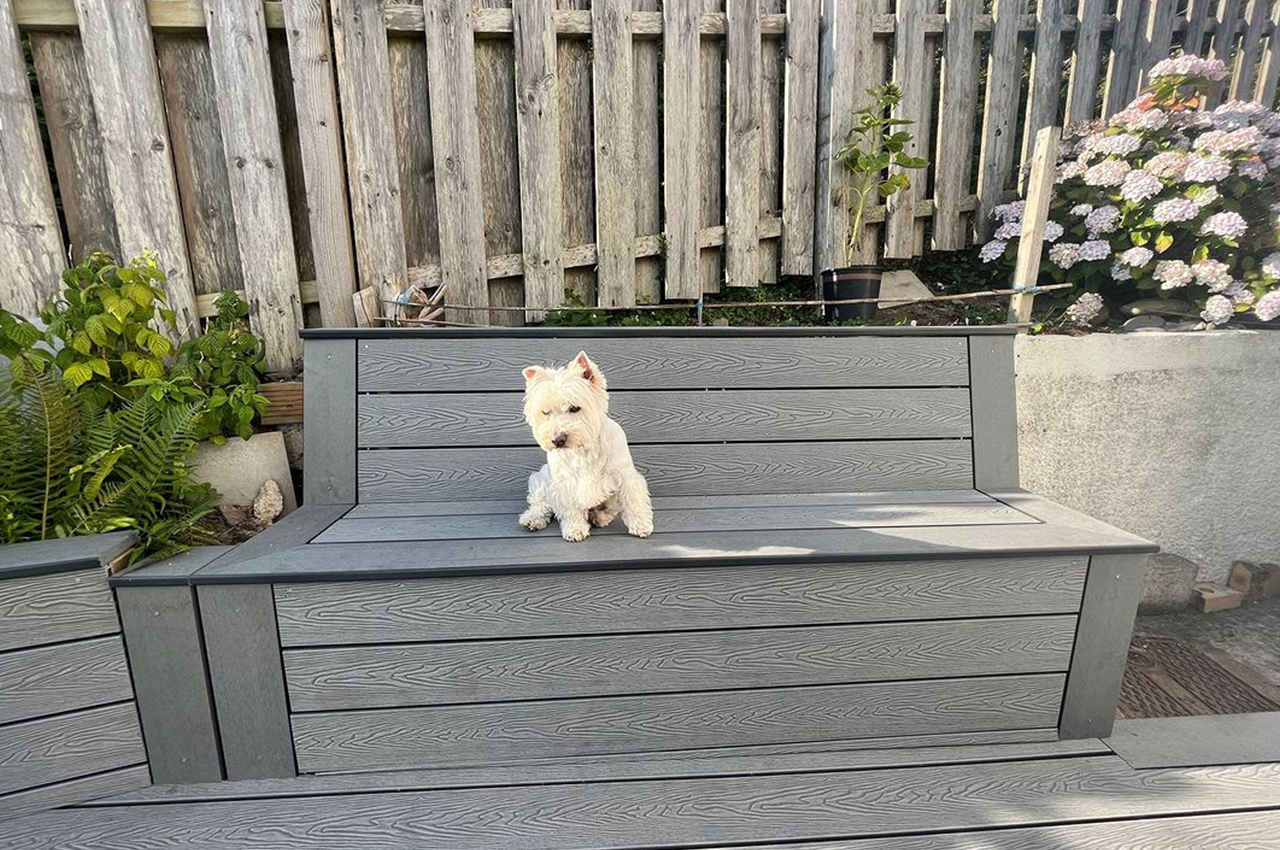 Cladco Woodgrain Composite Decking in Stone Grey for an outdoor seating area