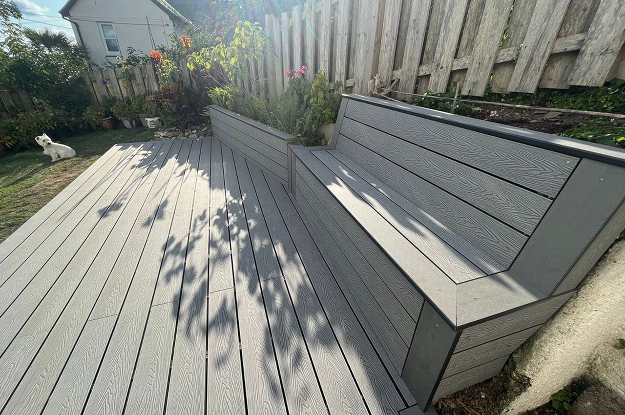 Cladco Woodgrain Composite Decking in Stone Grey for an outdoor seating area
