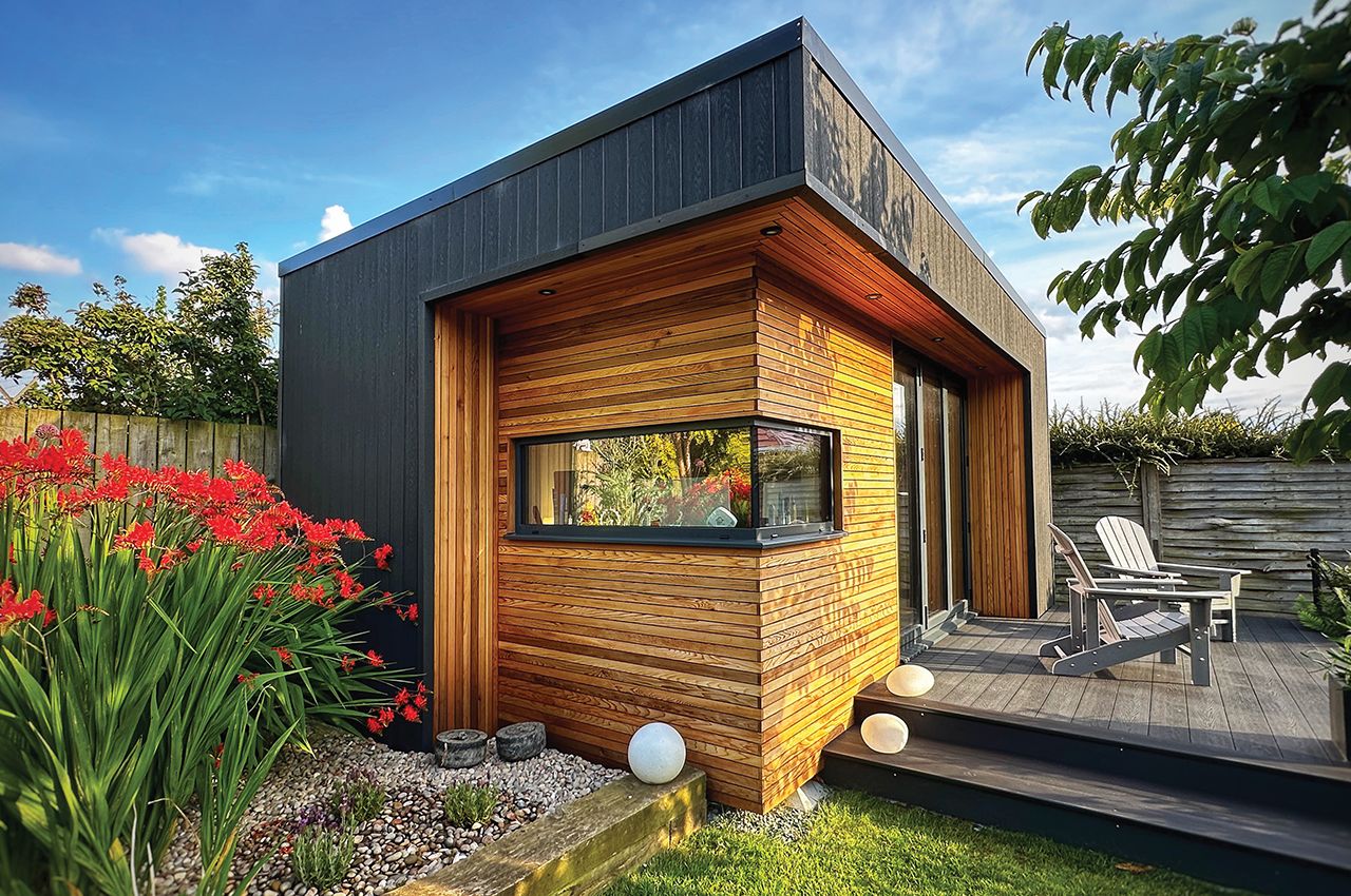 Garden studio with Cladco Composite Wall Cladding and Decking in Charcoal