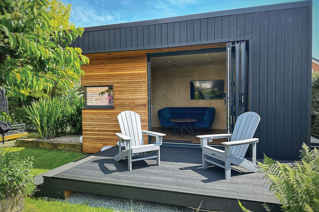 Garden studio with Cladco Composite Wall Cladding and Decking in Charcoal