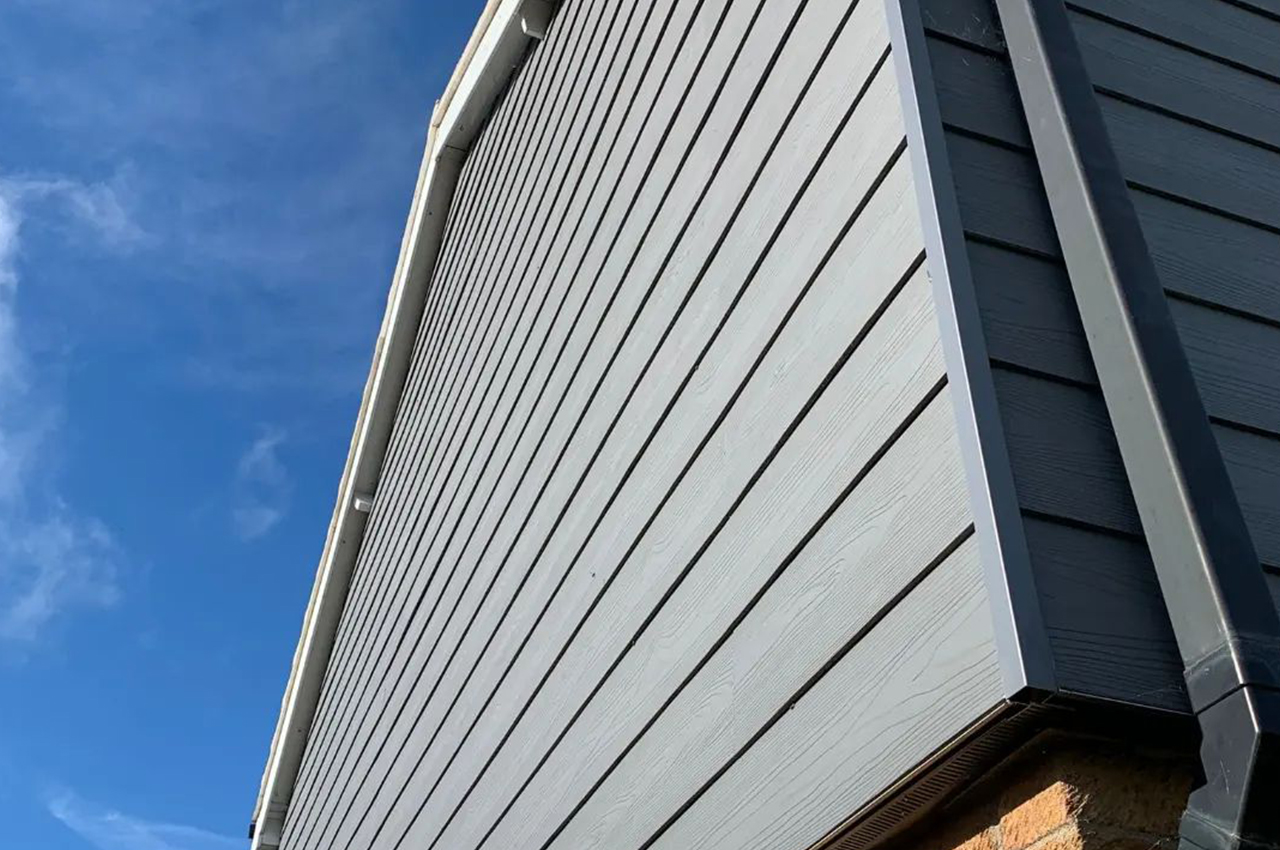 Upgraded home exterior with Cladco Fibre Cement Cladding in Slate.