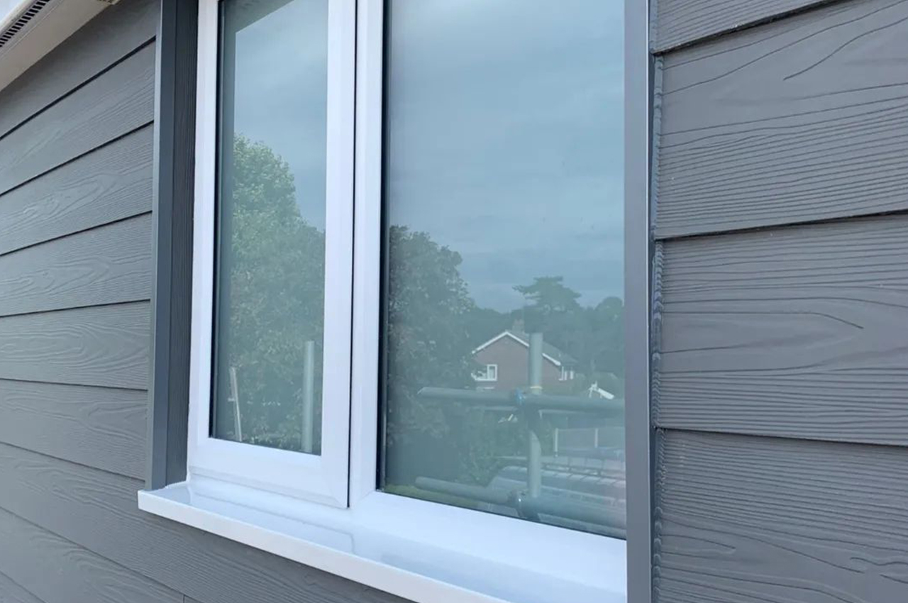 Upgraded home exterior with Cladco Fibre Cement Cladding in Slate.