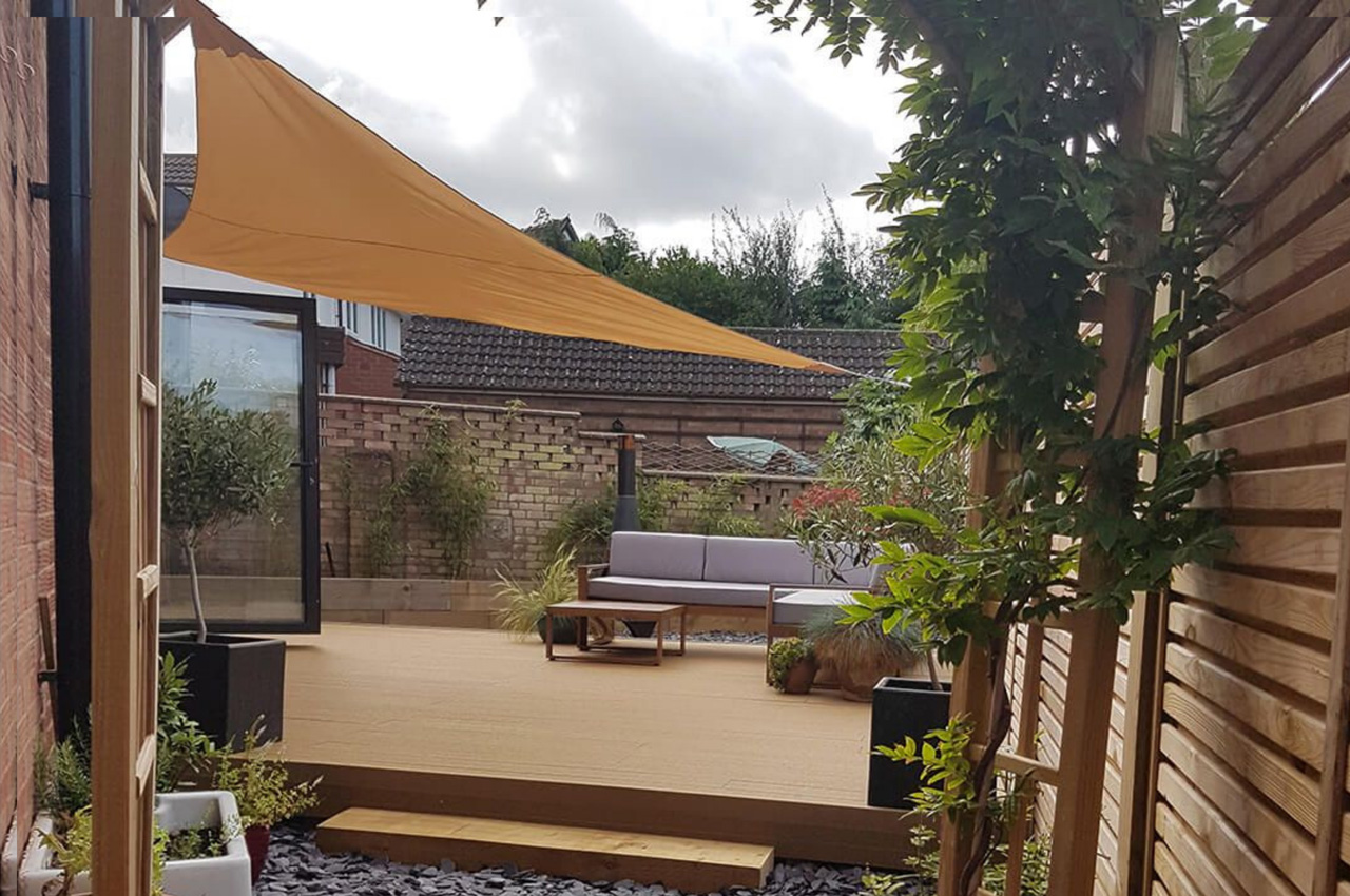 Teak Composite Decking with Shade Sail Net and Rattan Furniture