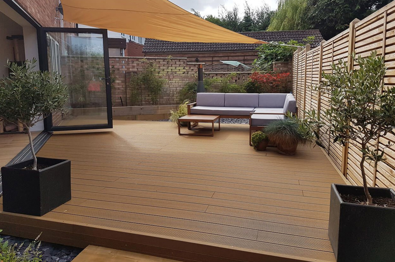 Teak Composite Decking with Shade Sail Net and Rattan Furniture