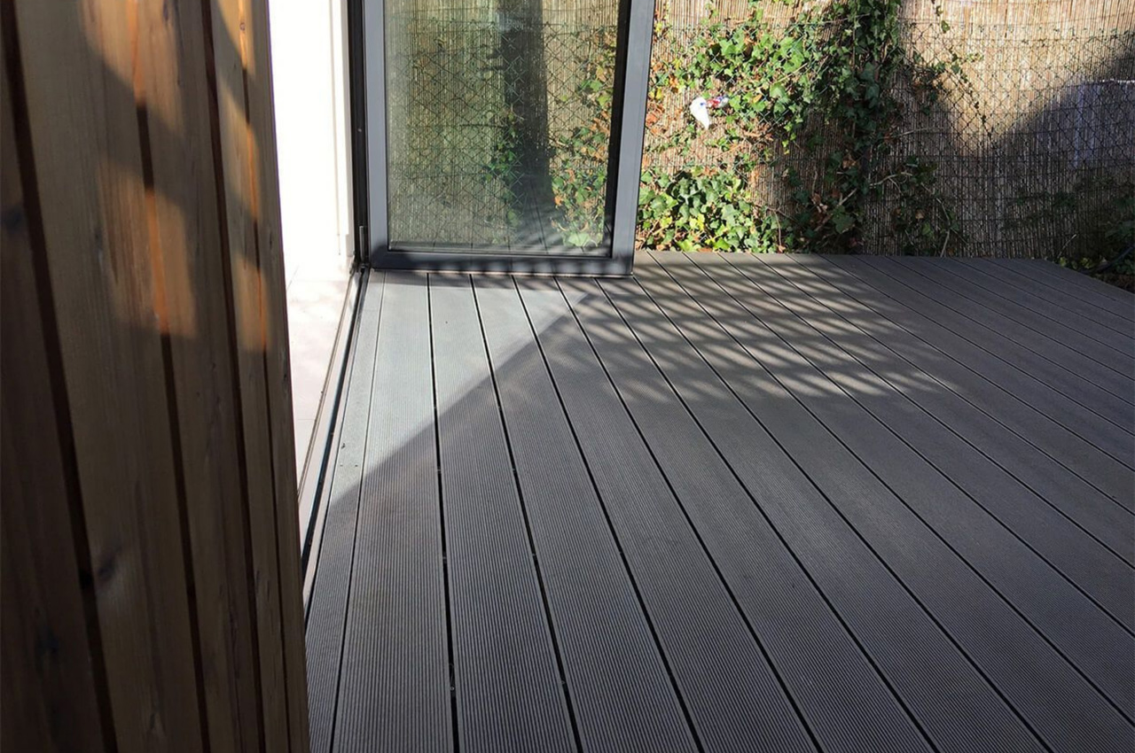 Stone Grey Composite Decking by Ark Design Build