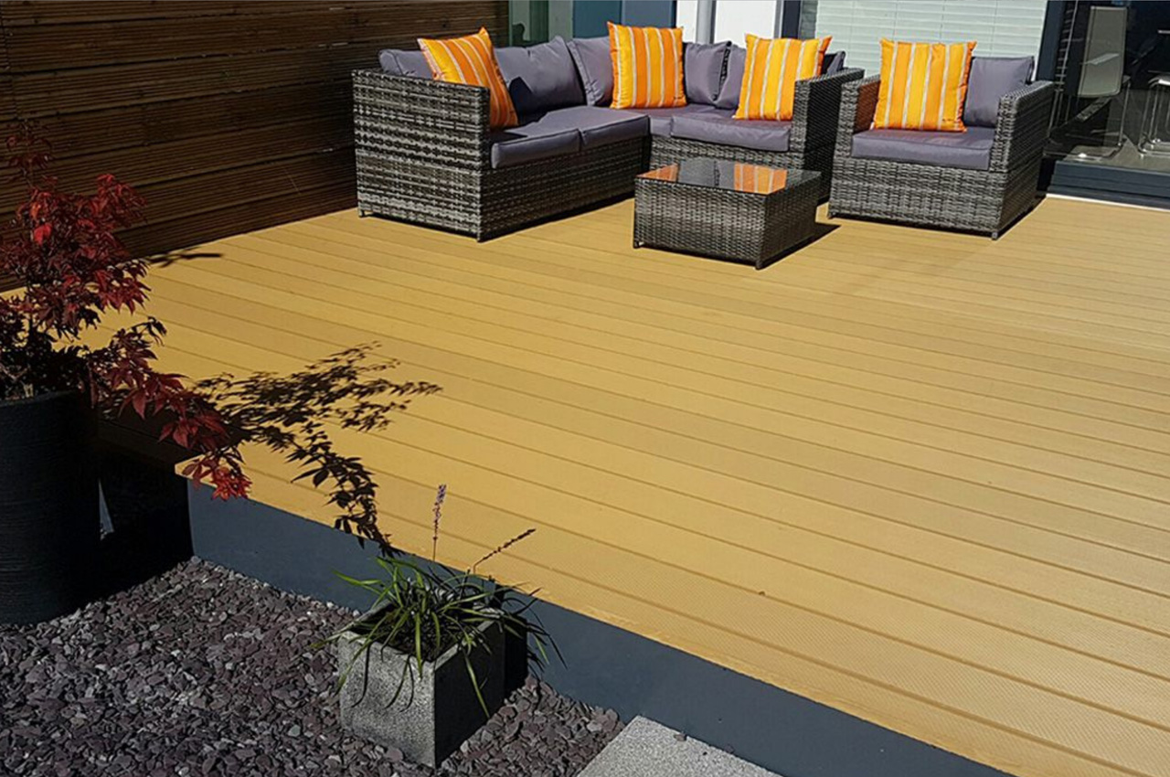 Three Story Contemporary House with Two Decked Areas in Teak and Charcoal.