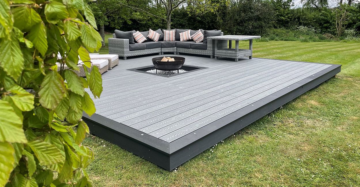 Firepit area built with Cladco Woodgrain Decking | @castleprimeconstruction_