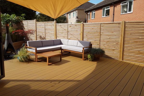 Teak Composite Decking with Shade Sail Net and Rattan Furniture