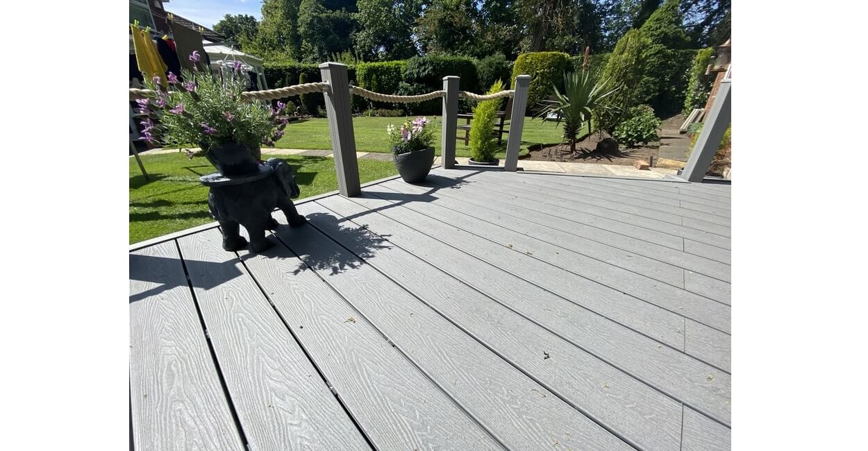 Composite Woodgrain Decking creates an attractive, low-maintenance, high-quality outdoor seating and eating area.