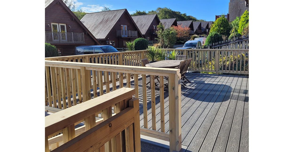 Stone Grey Woodgrain Composite Decking Boards installed by Gull Rock Co.