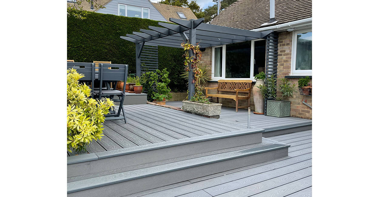 Garden Decking Space With Woodgrain Effect Composite Decking in Light Grey