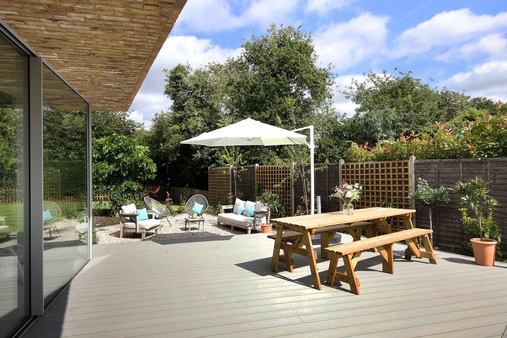 Bovingdon Homes has created this remarkable garden landscape using Cladco Composite Decking in Stone Grey