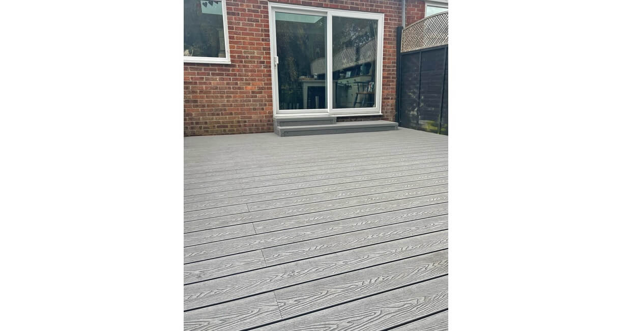 Old, rotten timber boards replaced by Stone Grey Woodgrain Composite Decking and Powder-Coated Aluminium Balustrade Handrails