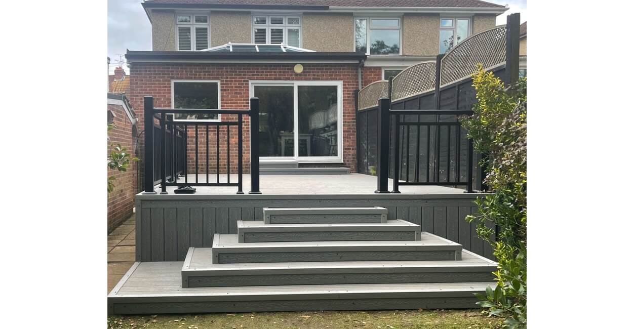 Old, rotten timber boards replaced by Stone Grey Woodgrain Composite Decking and Powder-Coated Aluminium Balustrade Handrails