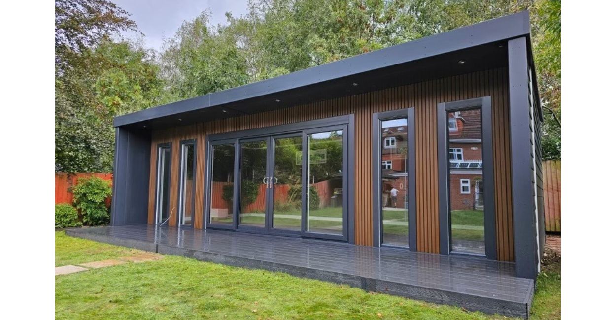  Modern summerhouse with Cladco Composite Slatted Cladding and Woodgrain Composite Decking.