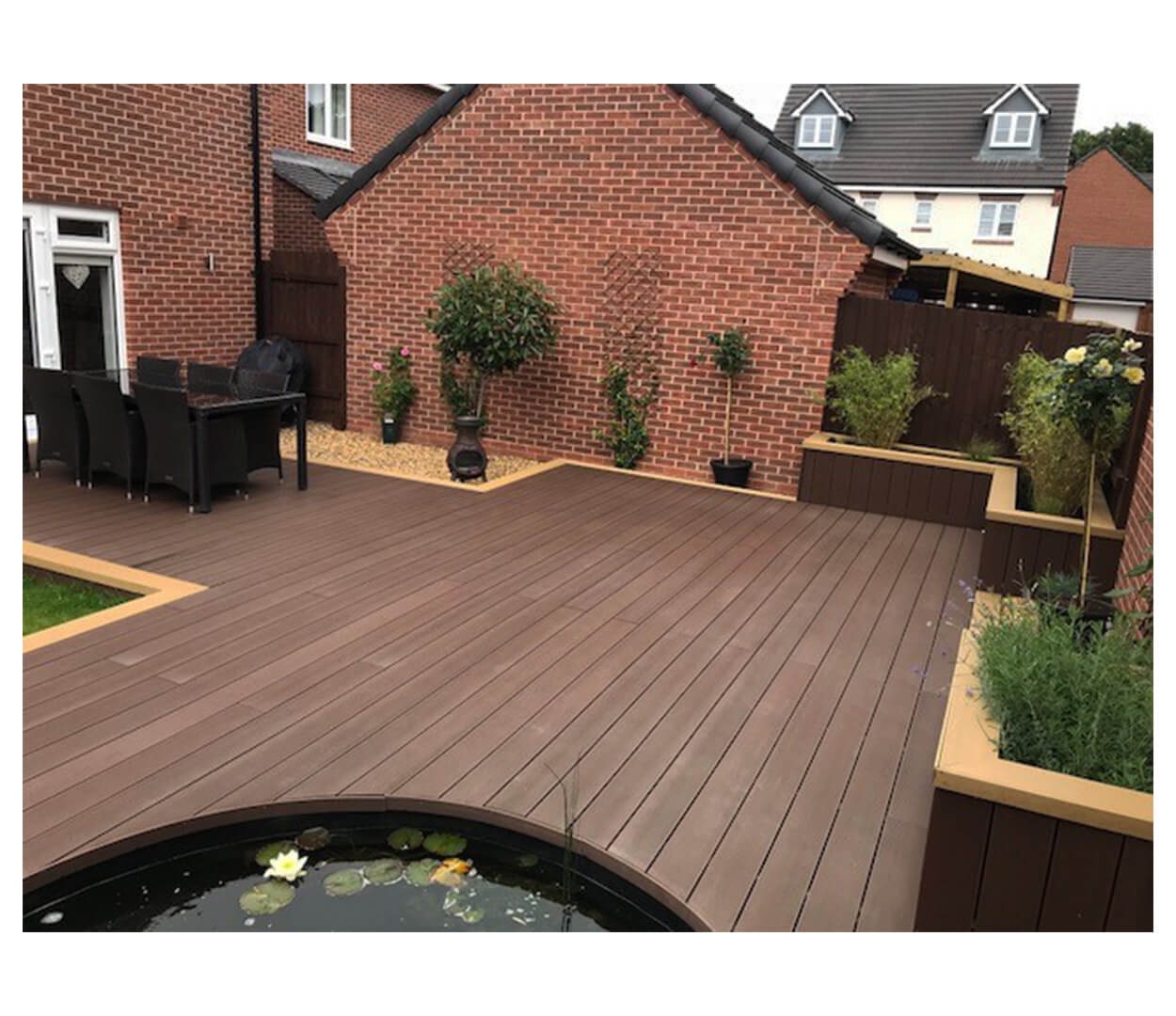 Cladco Composite Decking Boards in Coffee with Teak Edging Trim