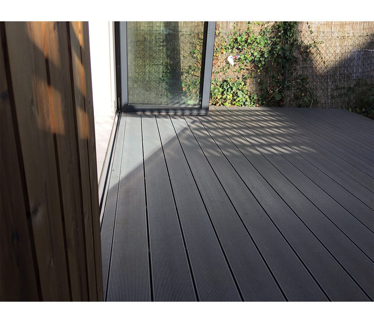 Stone Grey Composite Decking by Ark Design Build