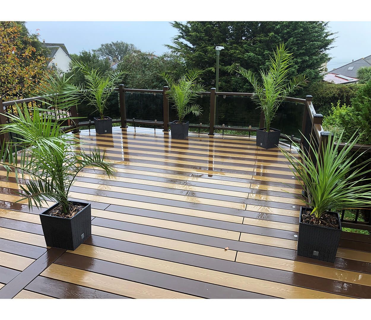 Cladco Composite Woodgrain Decking Boards in Teak and Coffee have created this strikingly unique decking design 