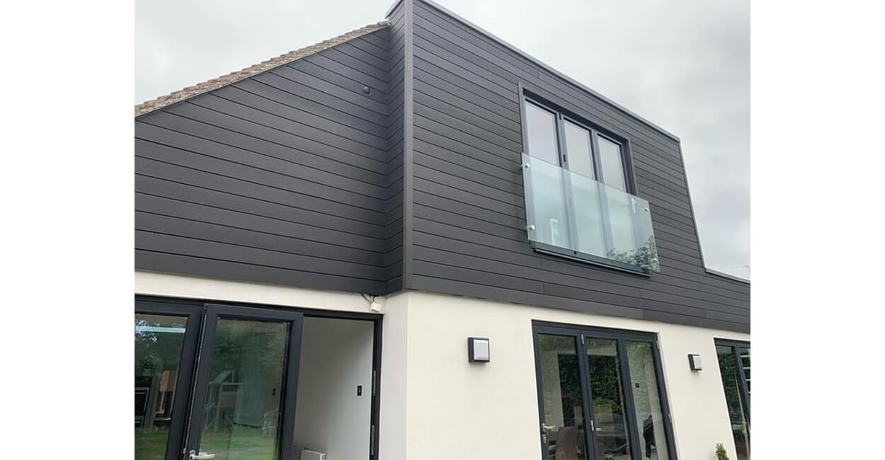 A large extension designed with Cladco Composite Wall Cladding Boards in Charcoal