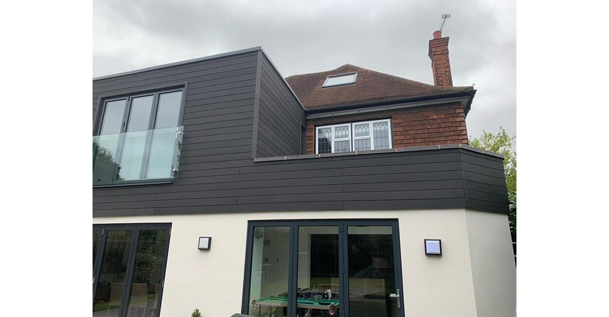 A large extension designed with Cladco Composite Wall Cladding Boards in Charcoal