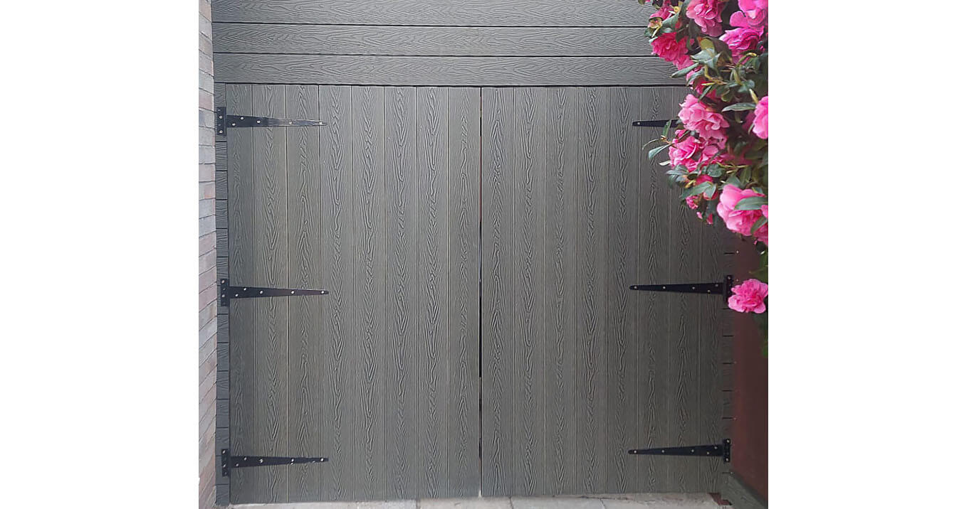 A homeowner has used Cladco Composite Woodgrain Decking for a garage gate 