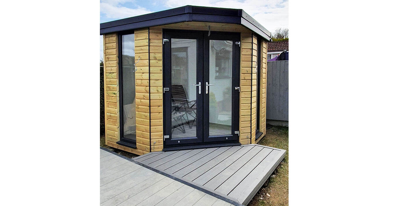 The entrance to this garden room was designed using Cladco Decking® in Stone Grey 