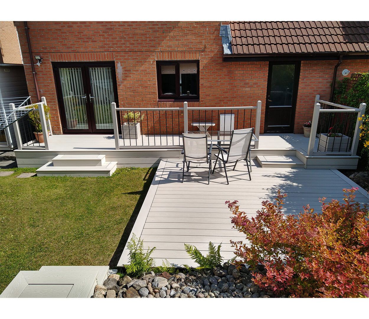 Cladco Composite Decking in Ivory gives this garden a unique and sophisticated look