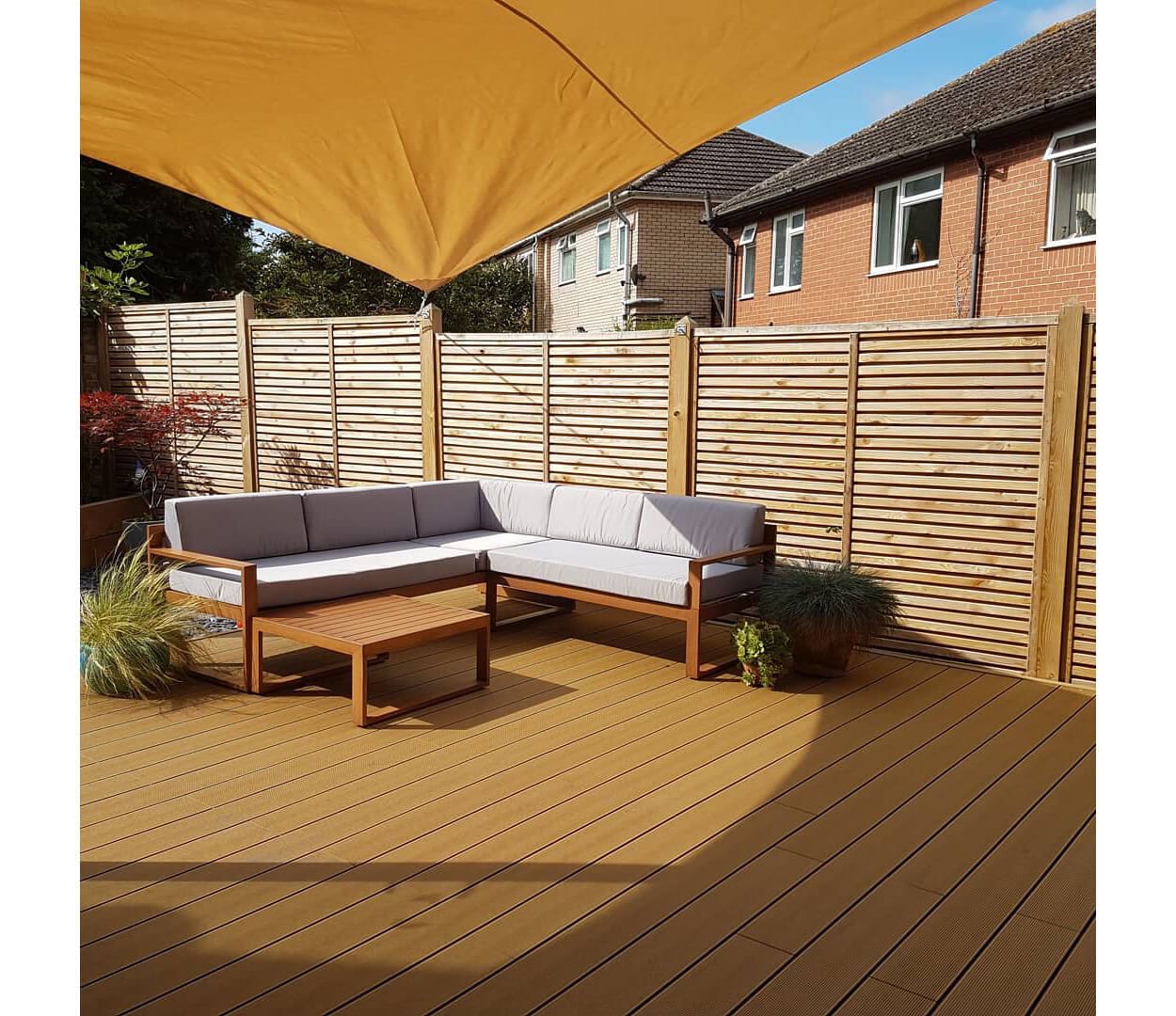 Teak Composite Decking with Shade Sail Net and Rattan Furniture