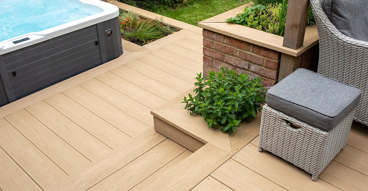 Elevate your outside living space with Cladco Premium PVC Decking Boards in Cedar Wood