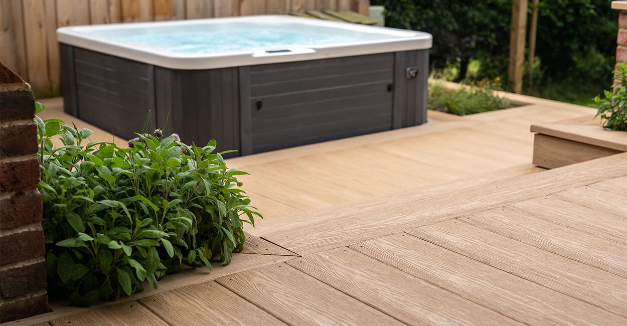 Elevate your outside living space with Cladco Premium PVC Decking Boards in Cedar Wood