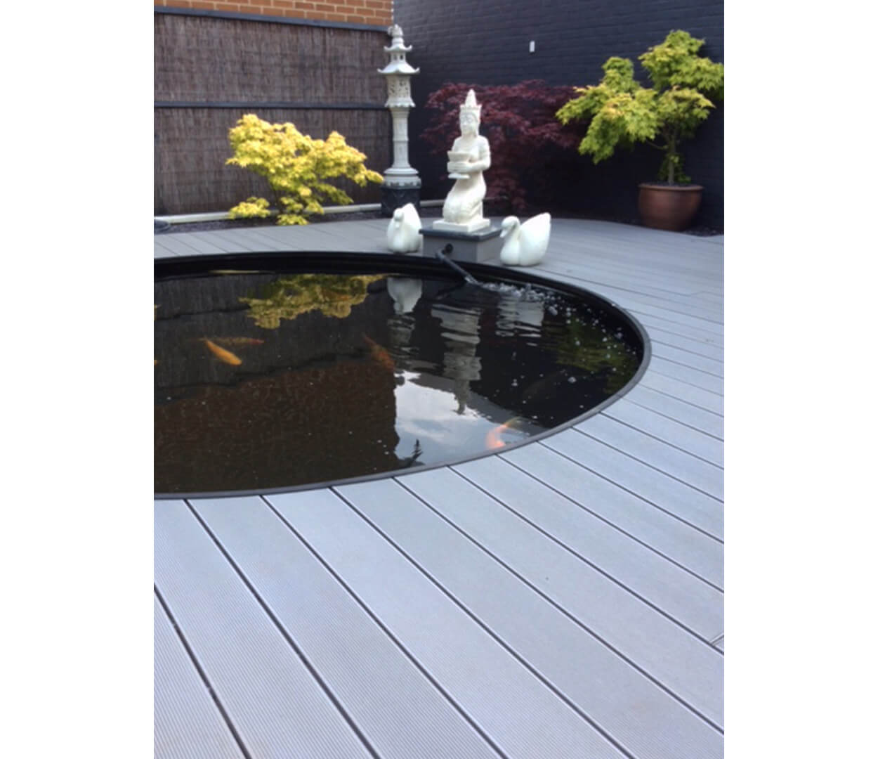 Light Grey Decking Boards with Built in pond