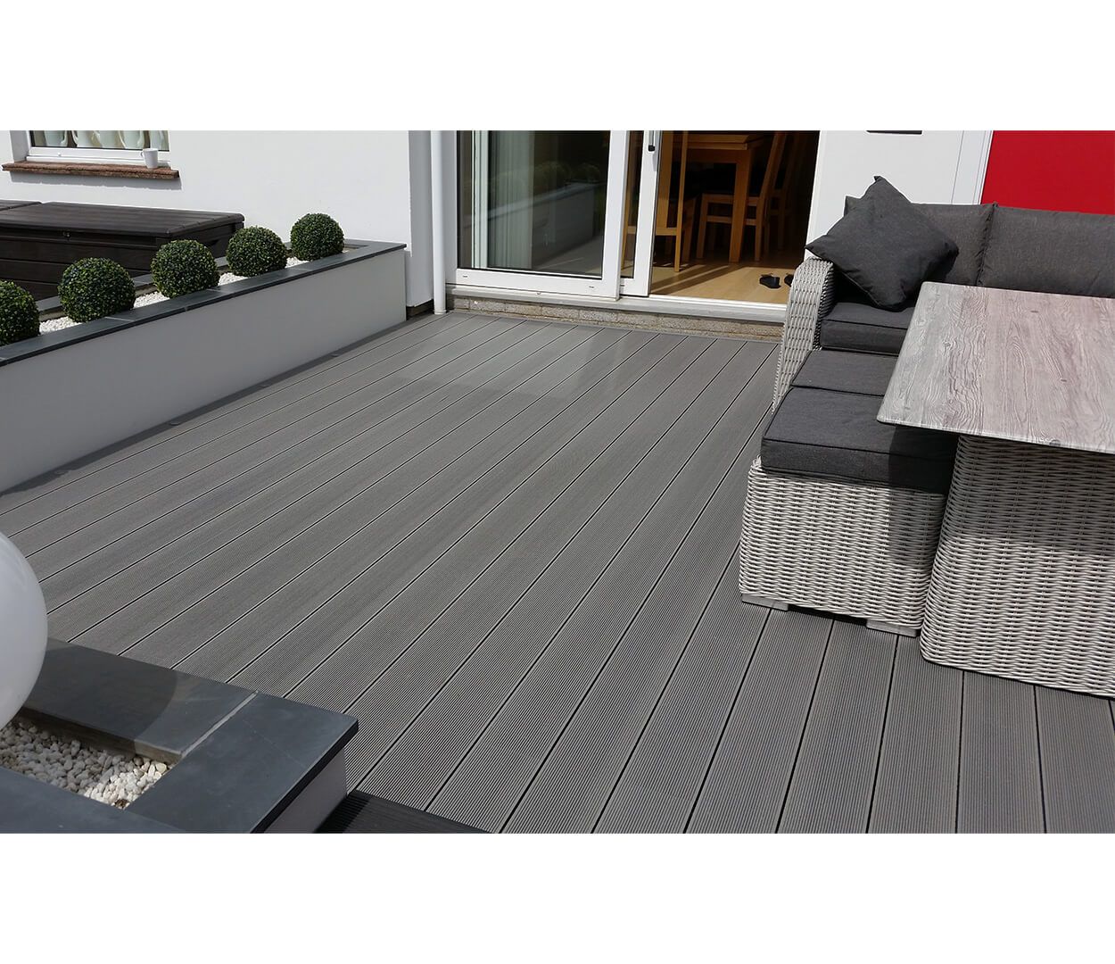 Cladco Stone Grey Composite Decking used in garden.